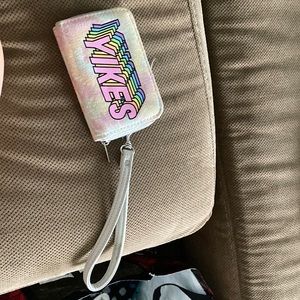 A small wallet, 4 1/2 inches long, 3 inches wide